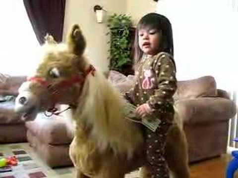 Cowgirl feeds Butterscotch