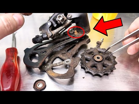 Bicycle rear derailleur restoration. Rust removal and maintenance.