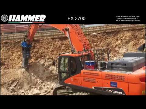 Hammer FX 3700 at work in quarry, Italy