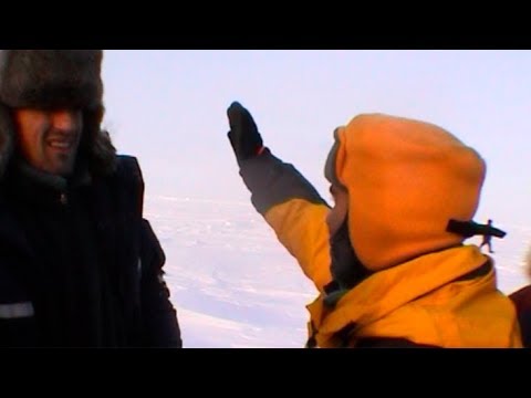 Checking the direction to the North Pole - Geographic North Pole 2002 expedition