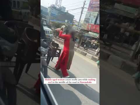 Woman Causes Traffic Jam in Nawanshahr While Filming Reel Video Goes Viral! #Nawanshahr #ViralVideo