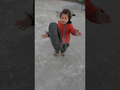 Funniest cutest baby reaction to tyre throw