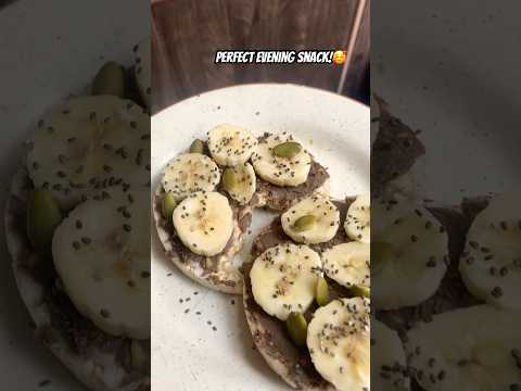 Peanut butter with banana & seeds on a rice cake✨ #healthysnacks #ricecake #peanutbutter #easy #yum