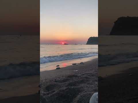 Beautiful sunset view at Buljarica beach in Montenegro filled with relaxing sounds of the sea.