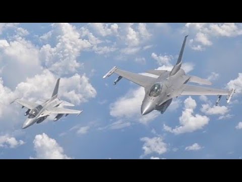 US F-16s and Philippine FA-50s fly in formation over the Philippine Sea