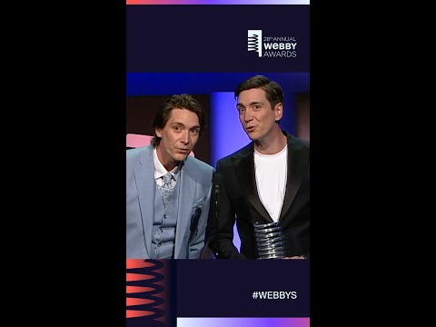 "Everybody, everywhere, playing Hogwarts Mystery"  the Weasley twins accept their Webby Award