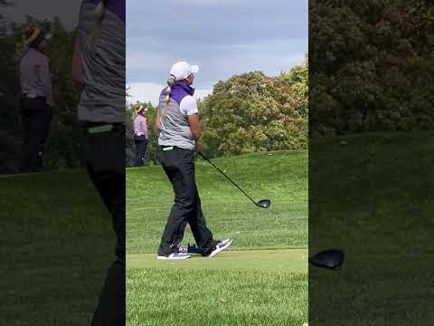 Golfers golfing