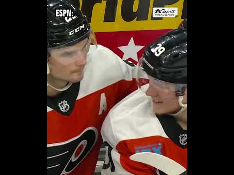 Laughton kisses Michkov's helmet after both return from injury scare