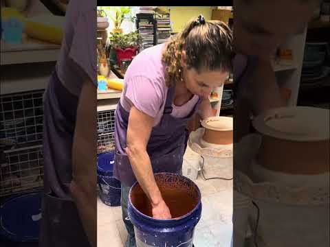 Glazing a cake plate. One piece that requires brushing, dipping and pouring of the glazes.