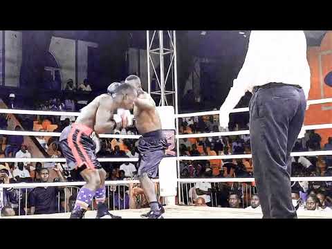 UGANDAN'S TYSON; WELTERWEIGHT SWALIK KISITU TYSON (BLACK PANT WITH STRIPES)TOO GOOD FOR IBRA MUBIRU.