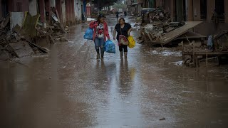 Residents in Spain cleaning up towns after devastating floods