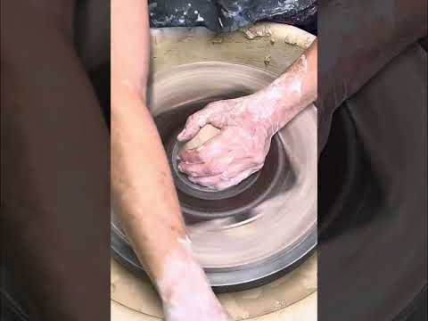 Wheel throwing a pottery jar and lid using minimal water. (Sound on for details)