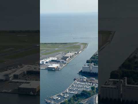 Spectacular view of Billy Bishop Toronto City Airport and Gardiner Expressway from the CN Tower!