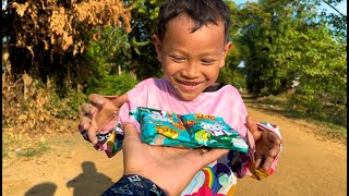 Children are happy when they eat delicious cakes for children in remote villages.