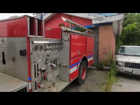 Luxury cars & Fire truck abandoned at a Airport Gas station