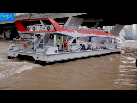 Heavy Rain and High Water Boat Traffic at Sathorn Pier Chao Phraya River Bangkok Thailand