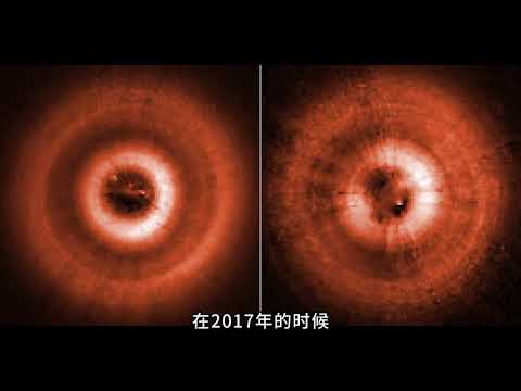 哈勃的拍摄：200光年外，一颗恒星，外围三圈奇特尘埃环