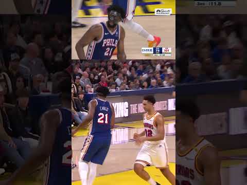 Joel Embiid throws one down against the Warriors