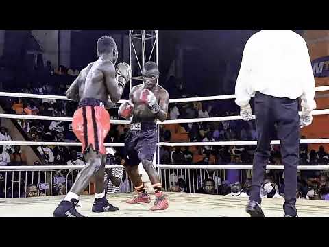 LIGHT WEIGHT ISAAC SSEBUUFU (RED SHORTS) RISE IN PRO BOXING,DEFEATS RIVAL FARAHAT MANILOLA.