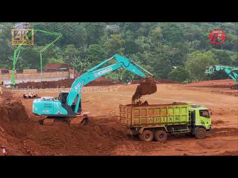 how Kobelco sk200 excavator saves a truck stuck in the muddy ground