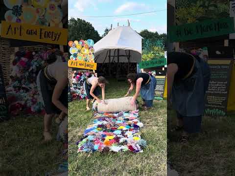 Rolling up The Mossy Carpet, time to head home from Glastonbury 2024