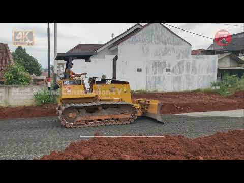 COOPERATION OF CATERPILLAR BULLDOZER AND LIUGONG VIBRO ROLLER IN ROAD CONSTRUCTION