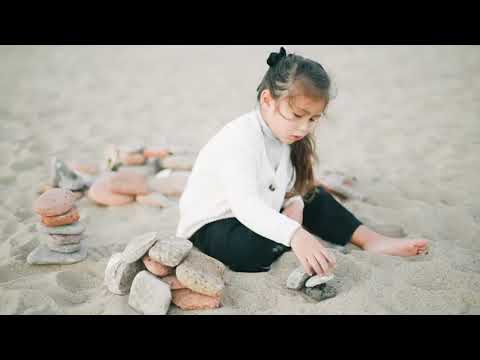 Girl Stacking Rocks | Copyright Free Video Footage