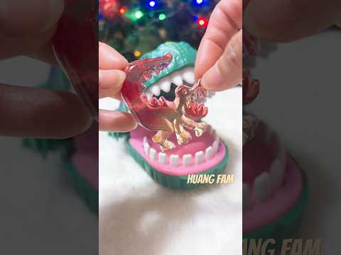 DINOSAUR DENTIST EATING GUMMY