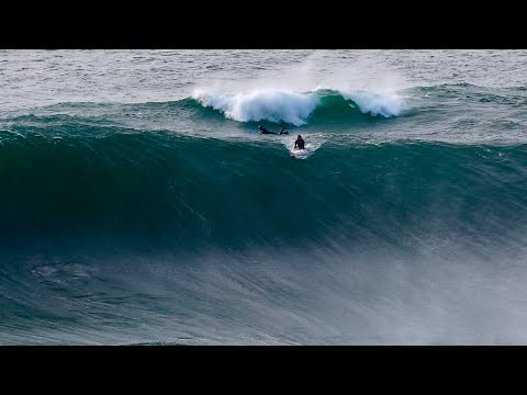 PADDLING BETWEEN GIANT WAVES SURFING EERIE OUTER REEF IN EUROPE!