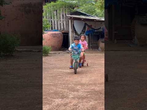 Two brothers racing bicycles And there was a very loud pipe sound.