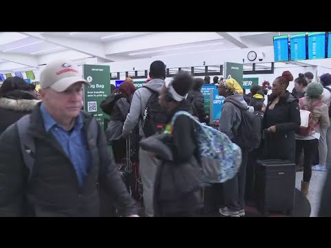 Travelers talk flying on Christmas Eve out of Hartsfield-Jackson Atlanta International Airport