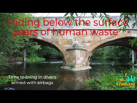 River Cleaning Under Medieval Bridge