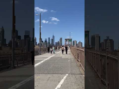 Strolling on the Brooklyn Bridge from Dumbo, with Olympia Tower standing tall by the side!