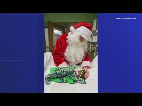 Newborn babies meet Santa on their first Christmas