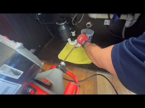 Unclogging a Kitchen Sink Drain With the Ridgid K-400