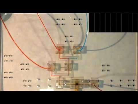 Microfluidic Modules with Integrated Solid-State Sensors for Reconfigurable Miniaturized Analysis