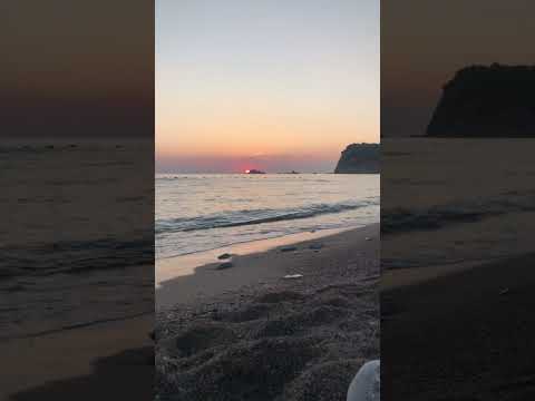 Beautiful sunset view at Buljarica beach in Montenegro filled with relaxing sounds of the sea.