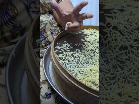 A woman in the Hammamet medina making Hlelem noodles by hand! #shorts #hlelem #handmade #tunisia