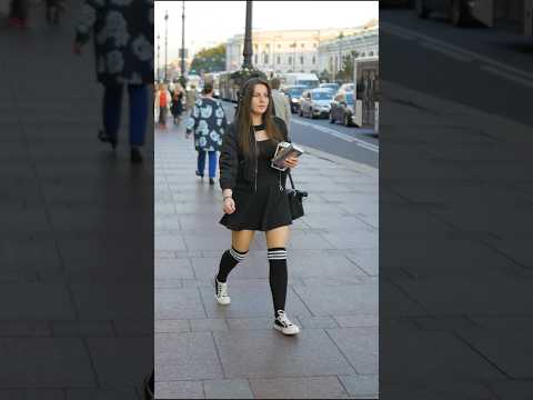 Beautiful fashion Russian girls, famous Saint-Peterburg, Russia street walk