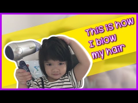 Adorable Little Girl Blowing Her Hair - So Cute