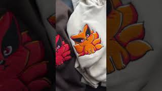 two intricately embroidered hoodies showcasing Naruto's baby Kurama. anime enthusiast #naruto #anime