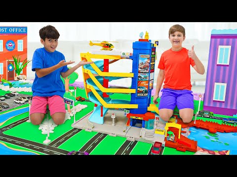 Roma and Friend play with Toy Cars and Build Matchbox City