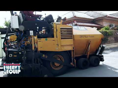 Asphalt Finisher Cat AP300D Crawling from Unloading spot to project site