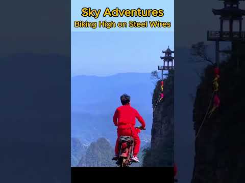 "Sky Adventures: Biking High on Steel Wires!"  #shortsfeed #viral #tranding #motorbike #mountains