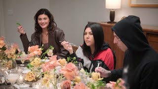 The Kardashian & Jenner family discuss various topics over dinner