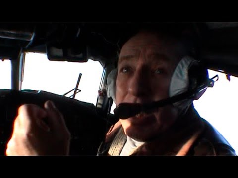 Pilot on the plane towards Arctic Ocean - Geographic North Pole 2002 expedition