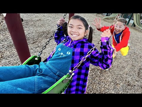 Emma Playing at Playground at the Park