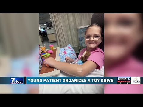 Young Patient Gives Toys to Children at Hospital