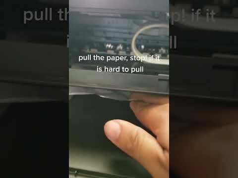 how to get jammed paper out of printer hp?