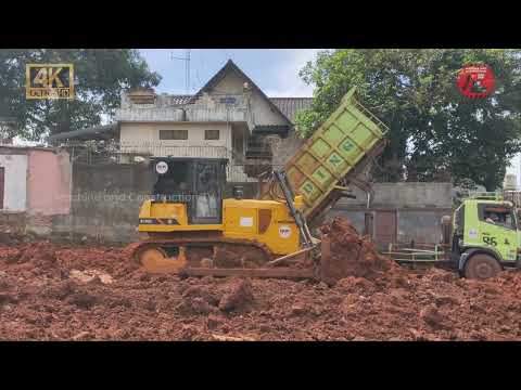 Dozer Spreading Soil for Road Construction